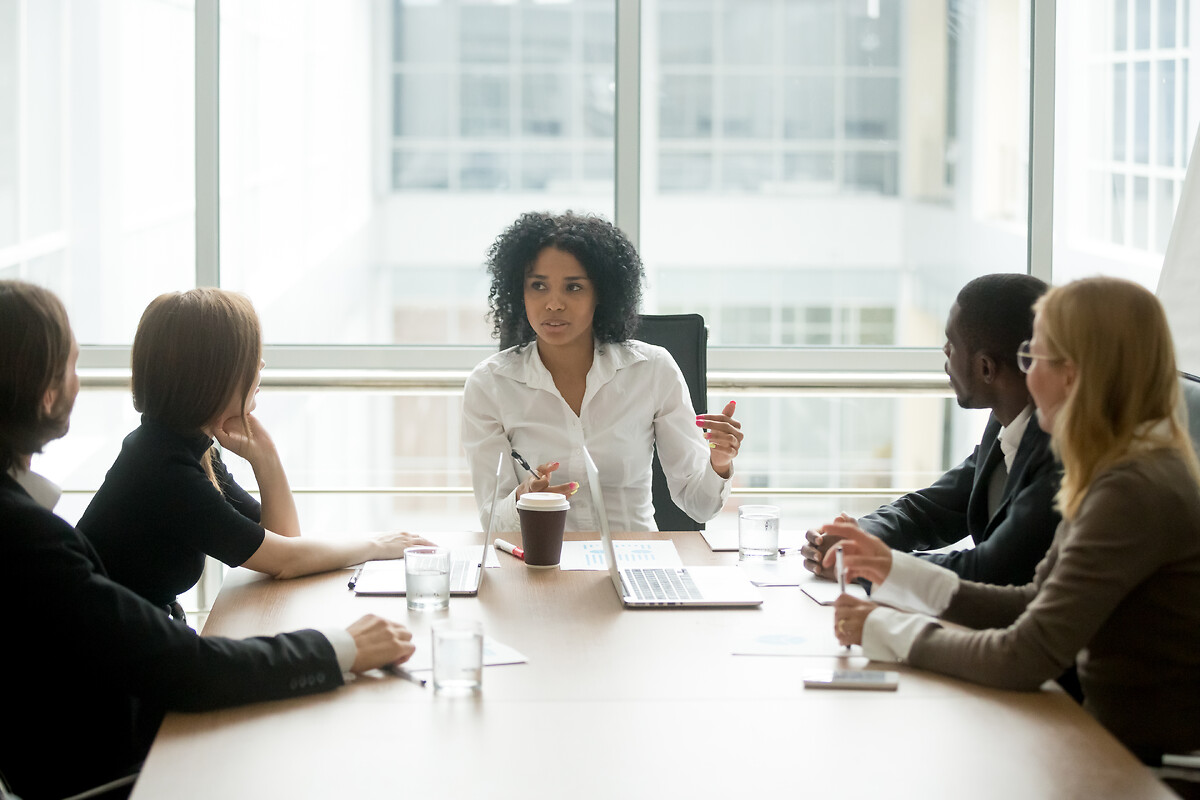 Woman in supply chain management meeting