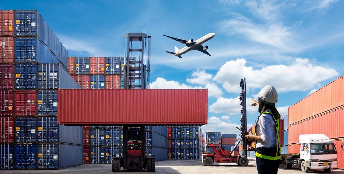 Freight containers port worker with equipment