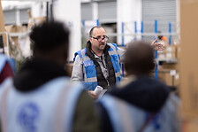 Geodis supervisor briefing a team of drivers