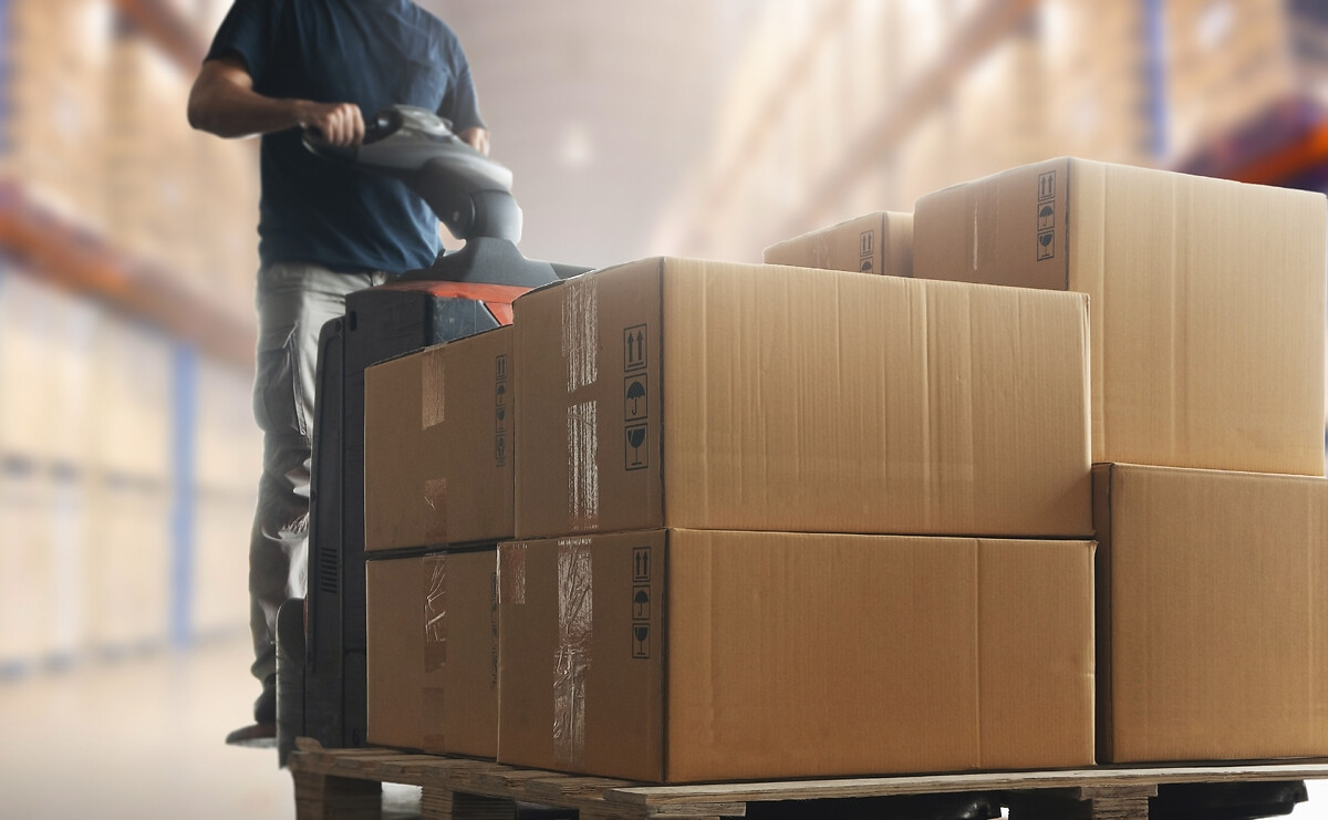 Parcels being wheeled on a trolley