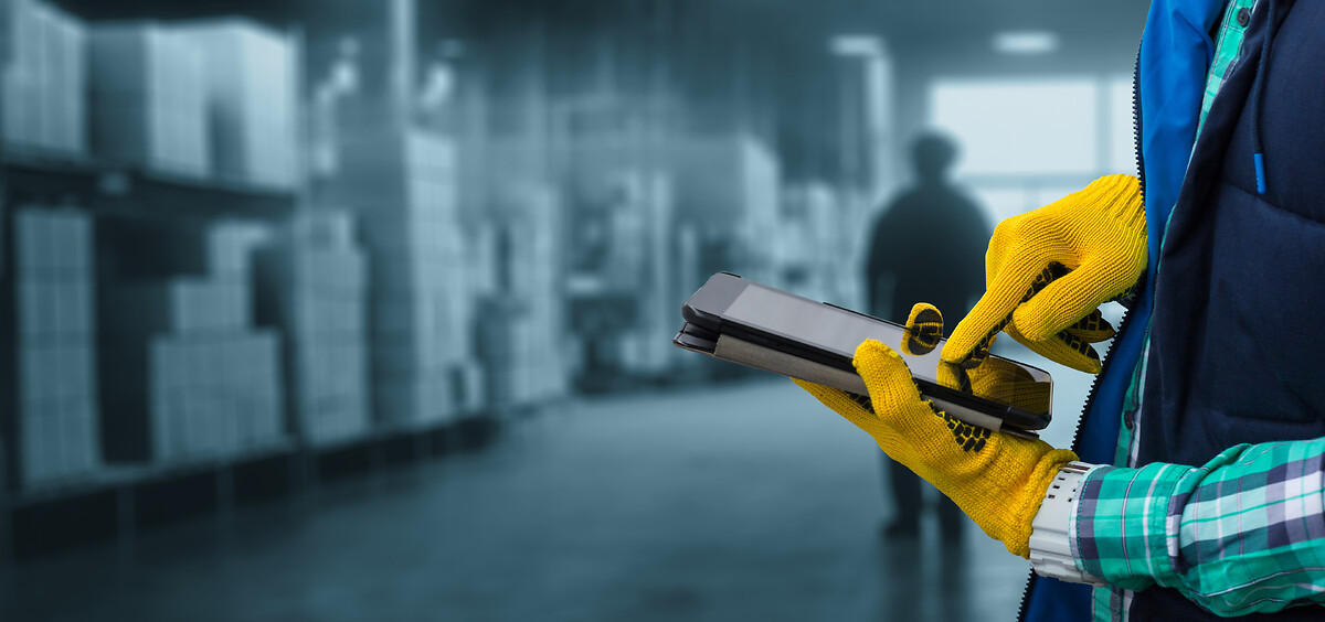 Warehouse and logistics workers using technology