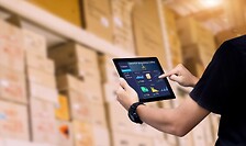 Warehouse and logistics workers using technology