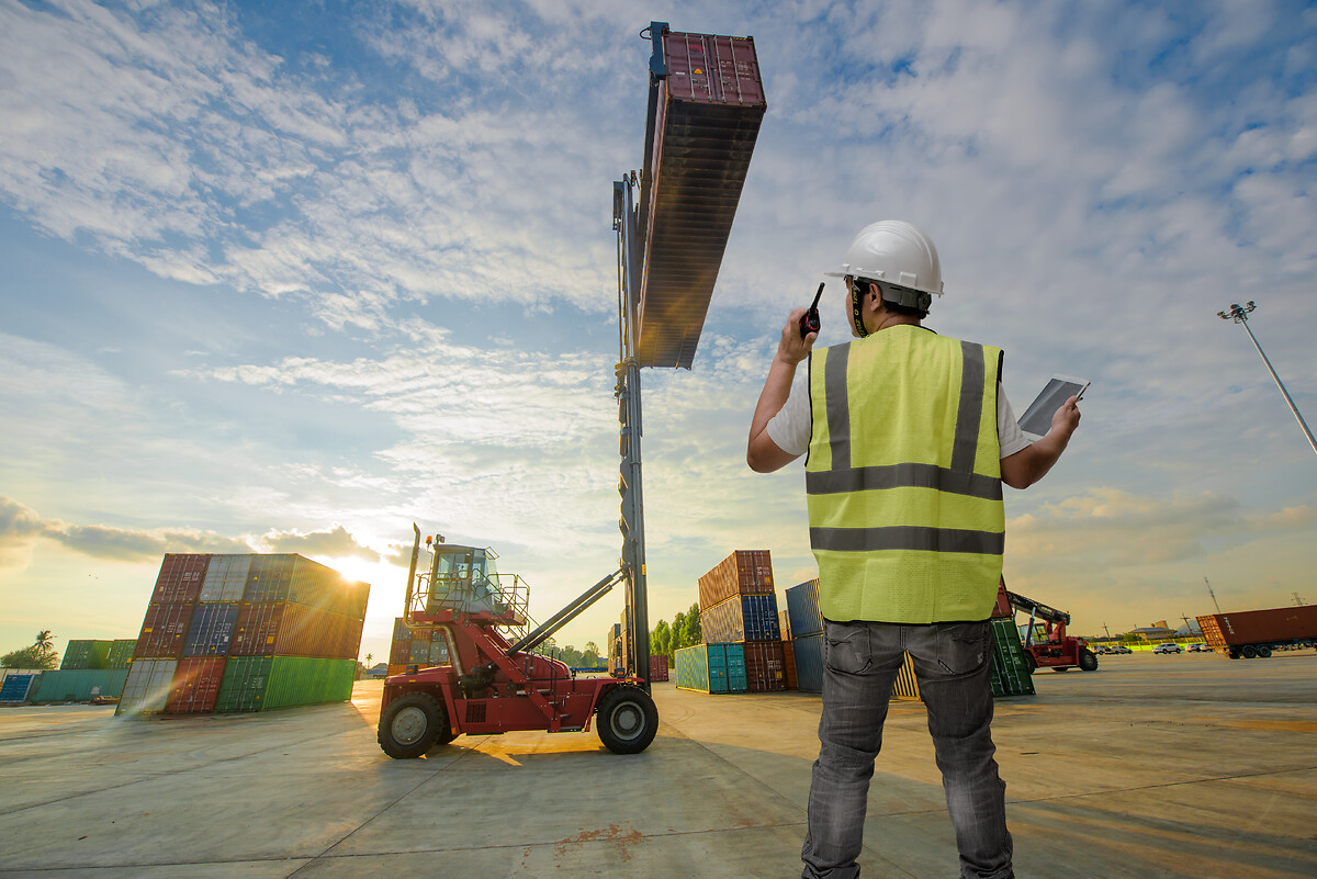 man in a port leading logistics operations