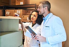 Healthcare professionals with parcels