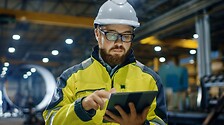 Warehouse and logistics workers using technology