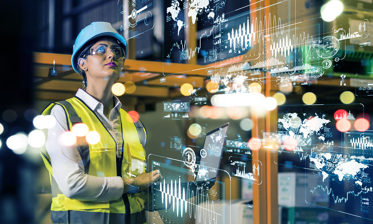 Woman checking warehouse automation