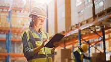 Warehouse and logistics workers using technology