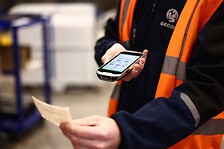 man scanning label in warehousing