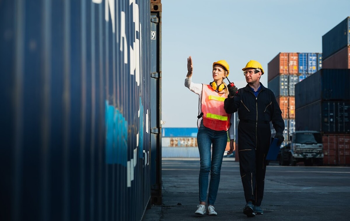 People discussing container freight