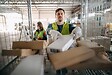 people_handling_packages_warehouse