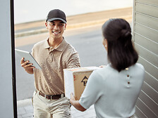 That was a fast delivery. Shot of a young woman receiving an order.
