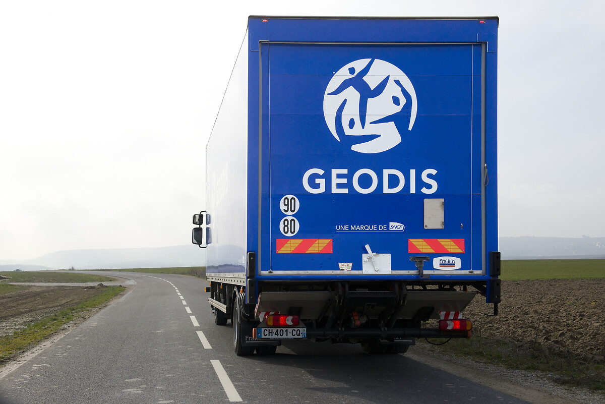 GEODIS truck with blue brand on the champagne roads